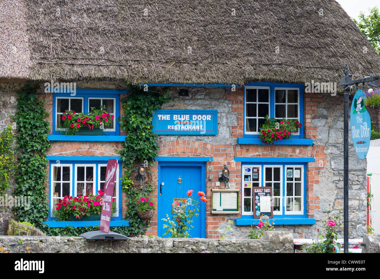 Traditional Thatched Cottages At Adare County Limerick Ireland