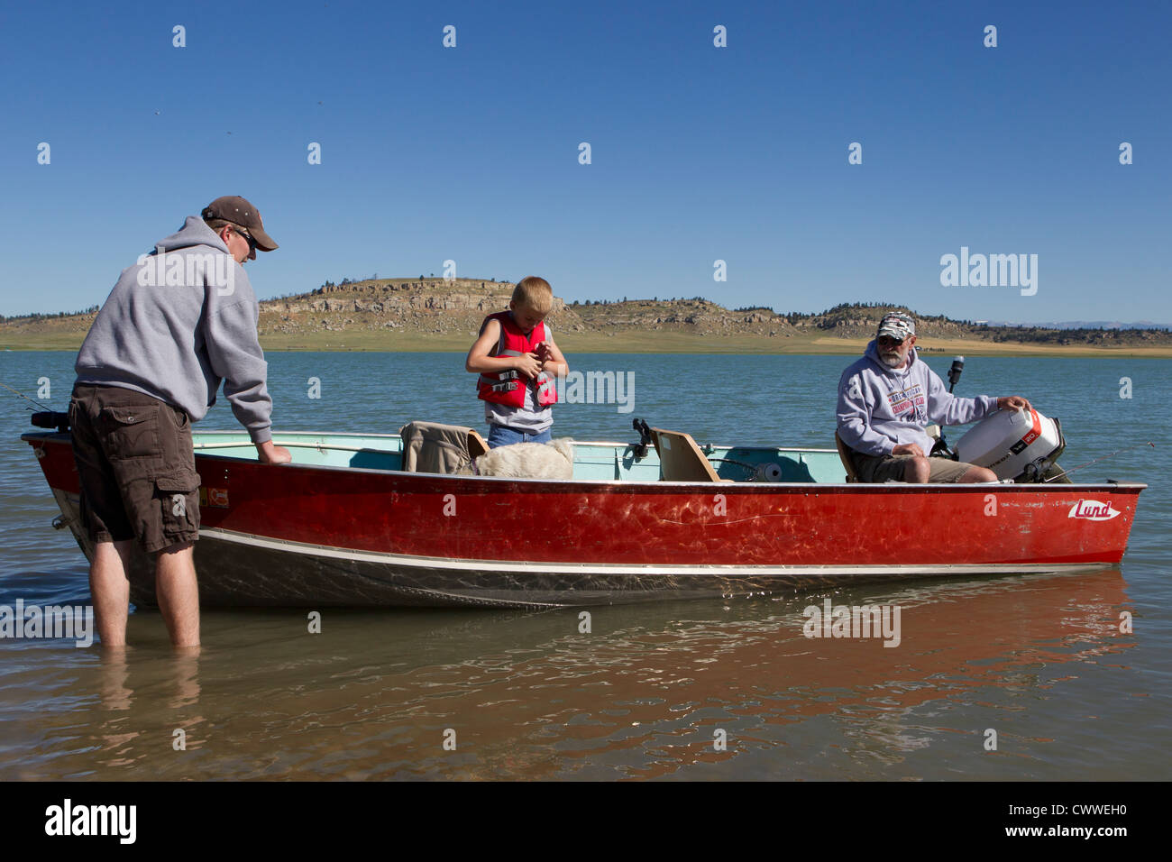A family gets ready to push off for some trout fishing on Deadman's