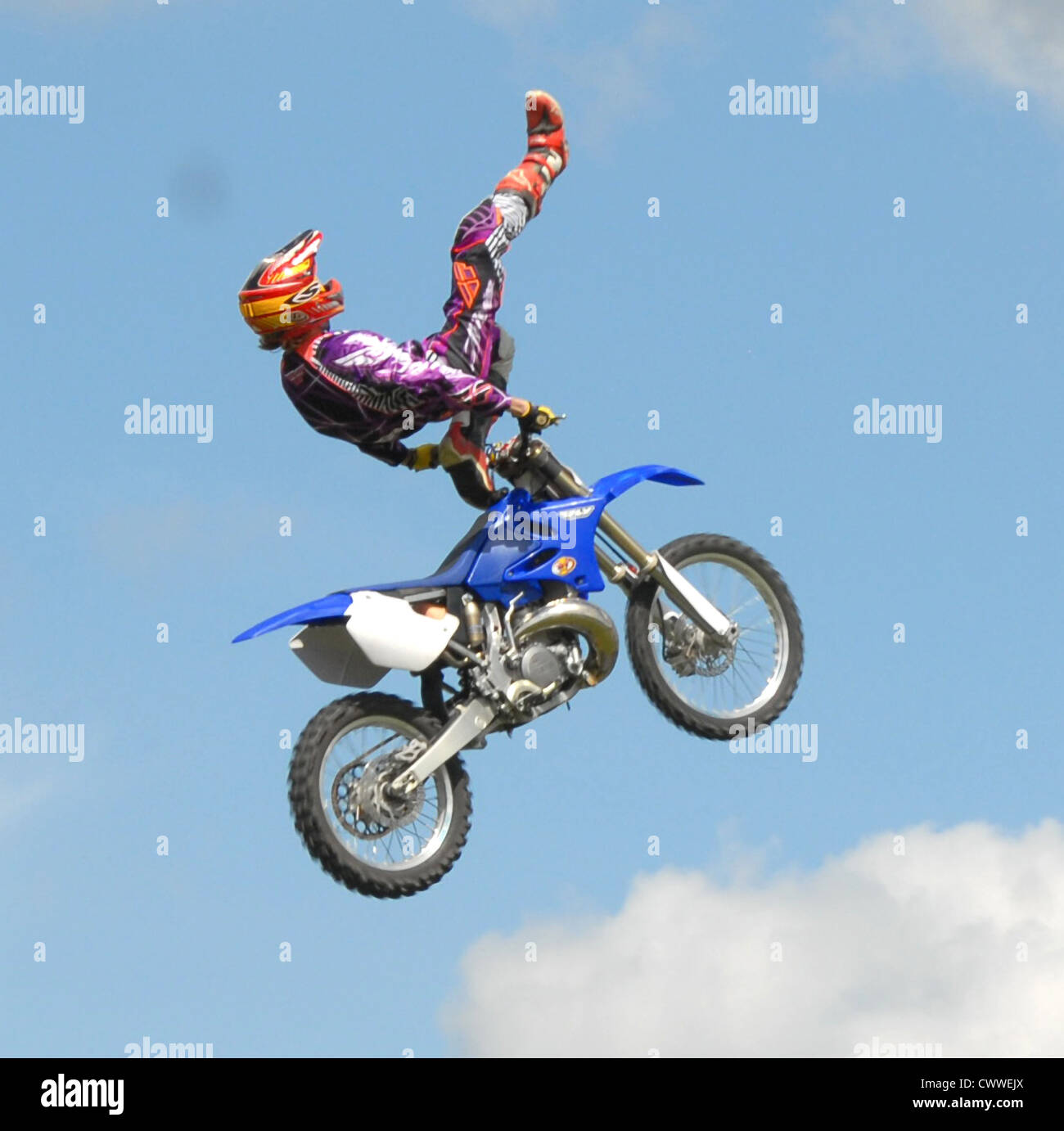 Motor cycles jumping ramps to heights of 35 feet Stock Photo