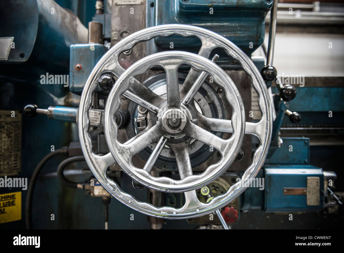 Wheel on lathe in car factory Stock Photo