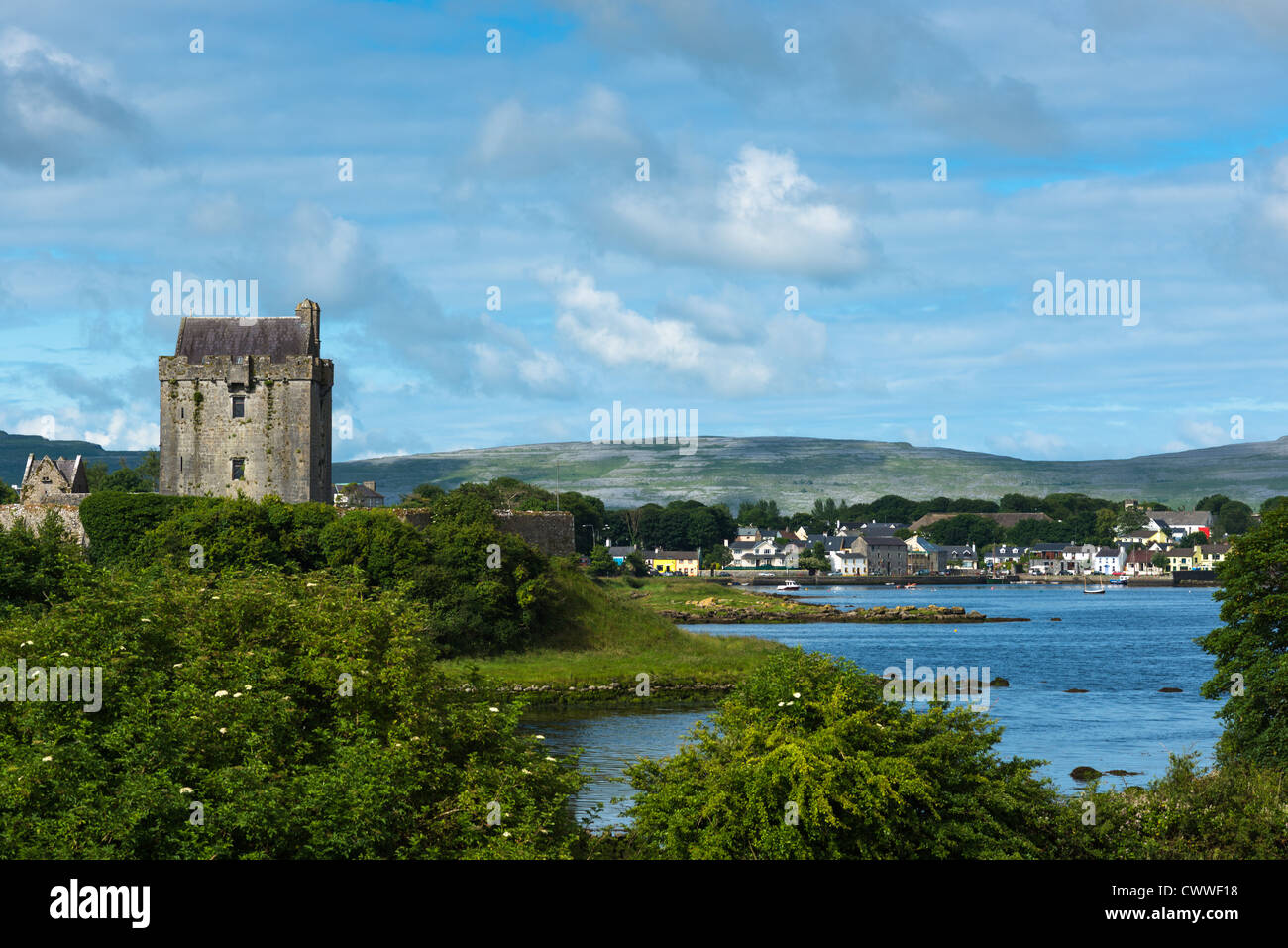 Dunguaire Castle with Kinvara village, County Galway, Ireland. Stock Photo