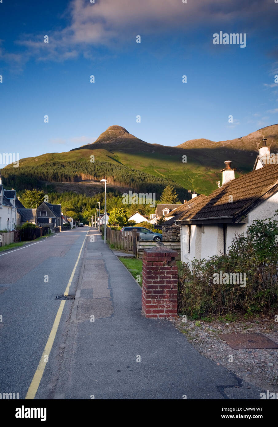 The road through Glencoe village in the Scottish Highlands, Scotland, UK Stock Photo