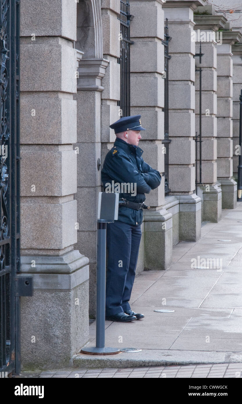 A garda on duty on Kildare Street in Dublin Ireland Stock Photo