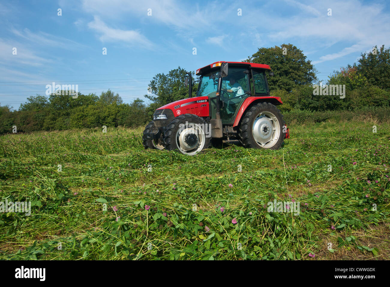 Case 106 JXU Tractor mowing Hay UK Stock Photo Alamy