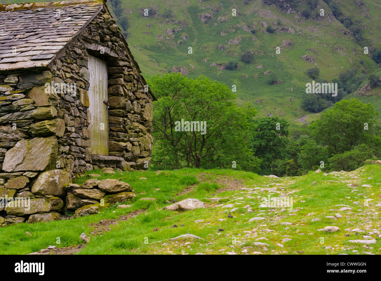 The entrance of a stone barn  near Dovedale Beck in the Lake District, Cumbria. Stock Photo