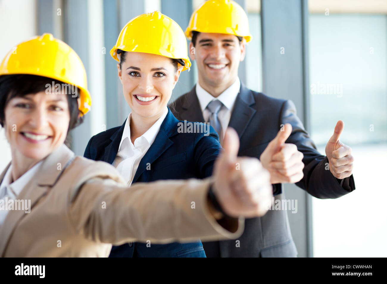 group of construction manager thumbs up Stock Photo - Alamy