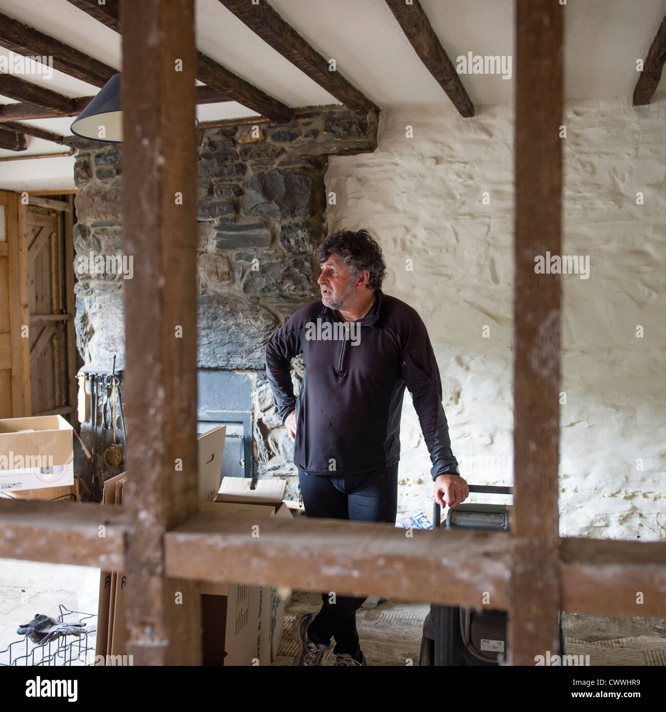 Mick Fothergill inside his flood damaged house Talybont Ceredigion Wales UK, August 2012 Stock Photo