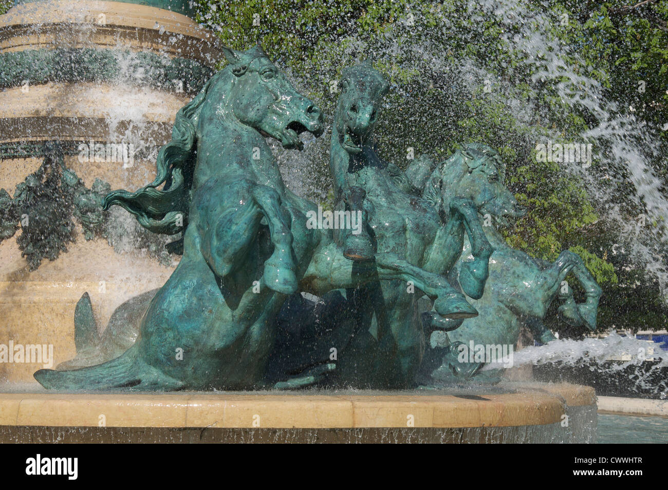Fountains. Galloping horses charge through the water jets of the monumental Fontaine de l’Observatoire in the Jardin Marco Polo. Paris, France. Stock Photo