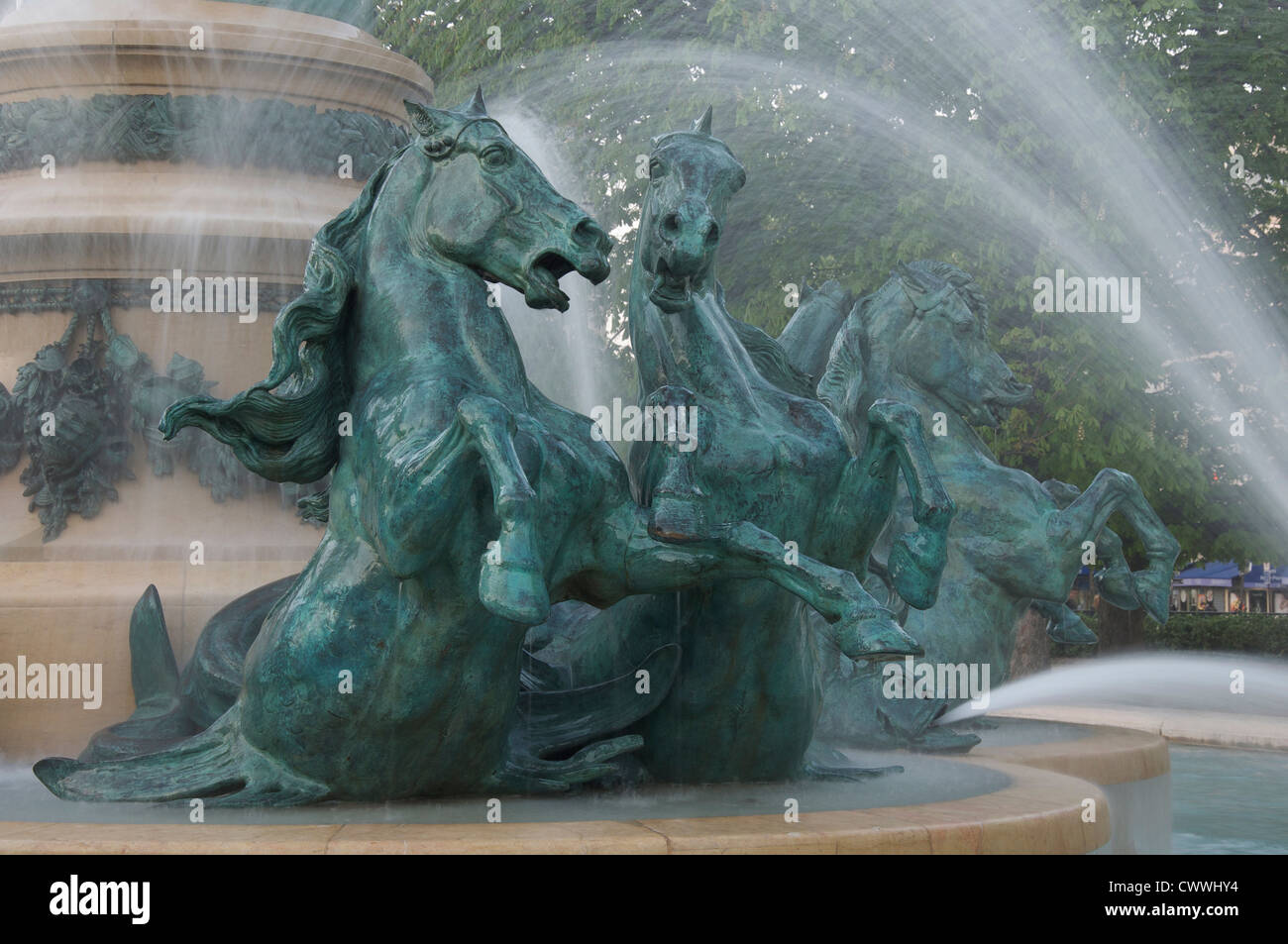 Fountains. Galloping horses charge through the water jets of the monumental Fontaine de l’Observatoire in the Jardin Marco Polo. Paris, France. Stock Photo