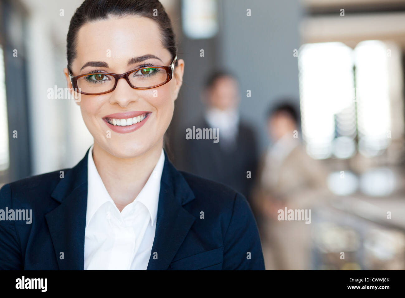 Businesswoman in suit glasses hi-res stock photography and images - Alamy