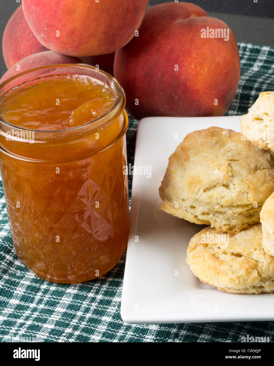 Biscuits with fresh peach jam or jelly with peaches Stock Photo Alamy