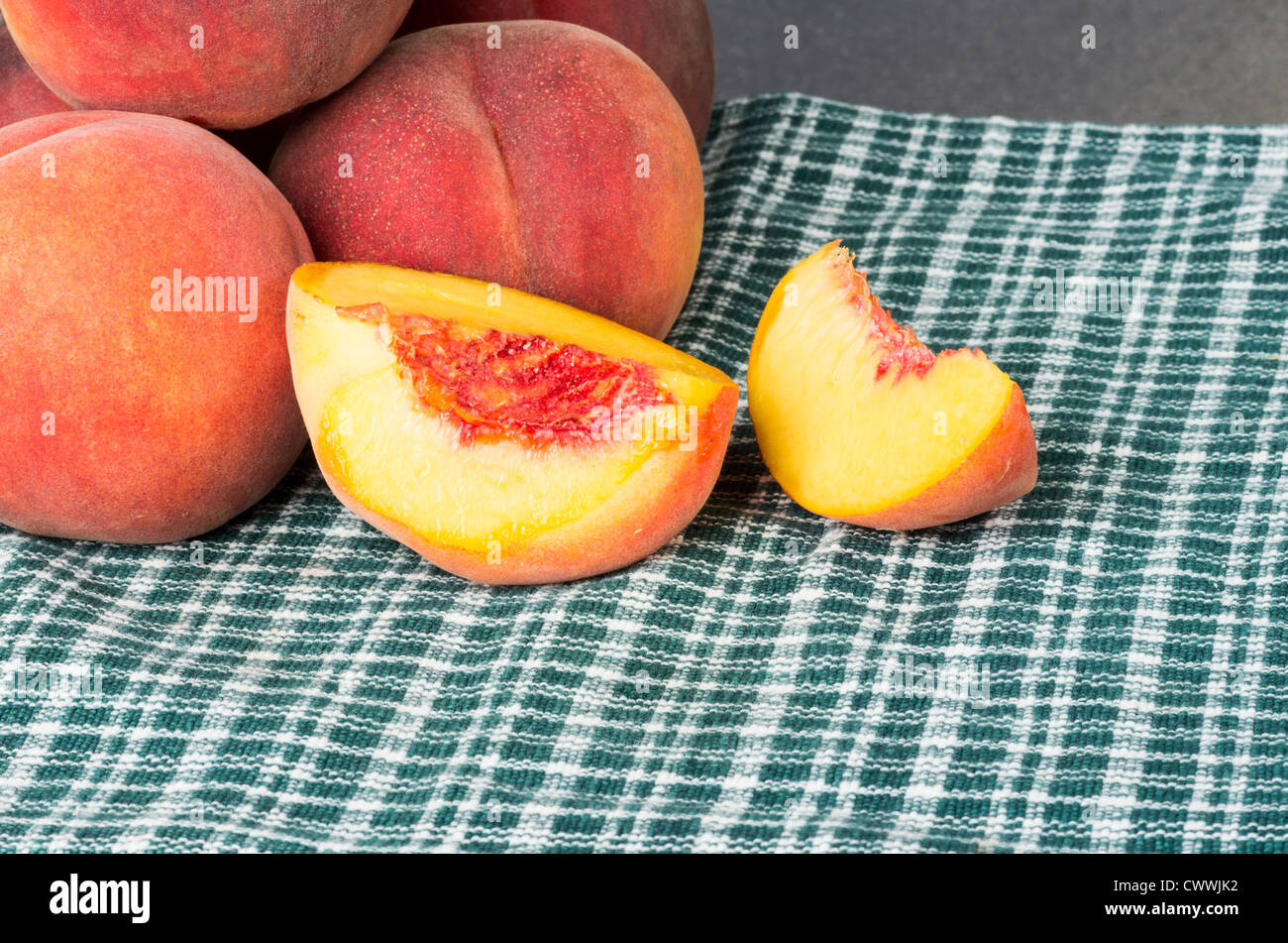 Freshly picked ripe peaches sliced and whole Stock Photo - Alamy