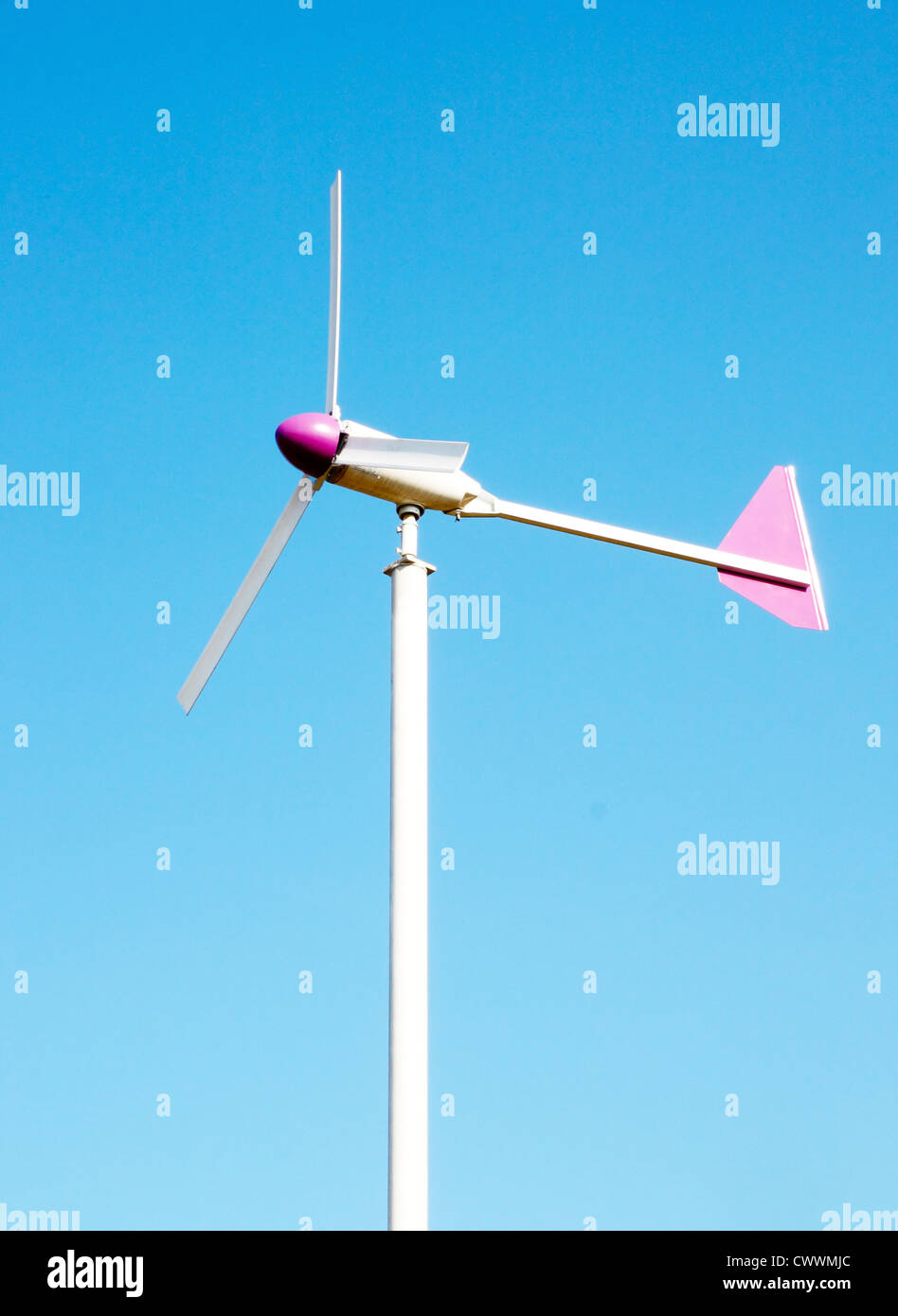 wind turbine on blue sky background Stock Photo - Alamy
