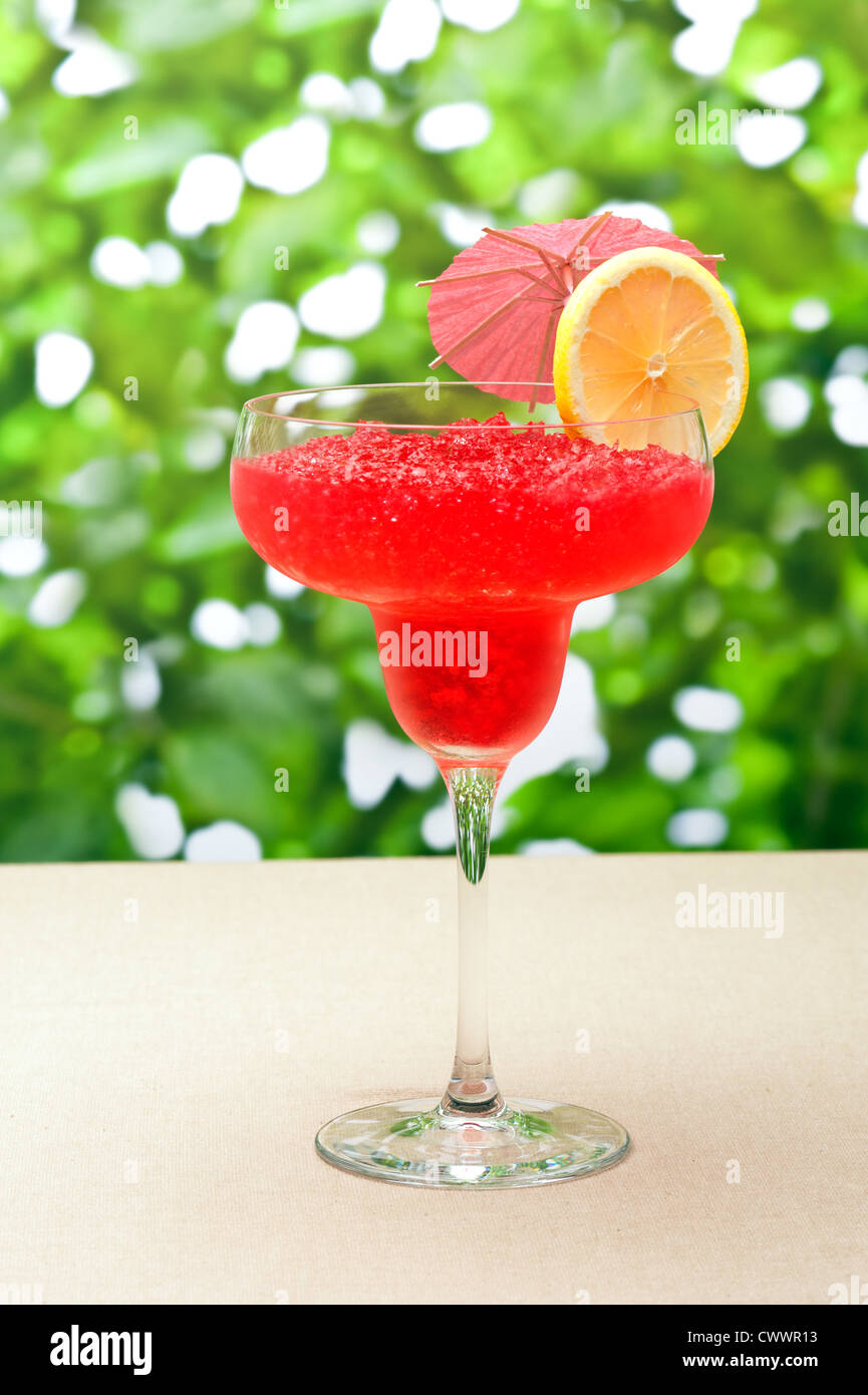 Strawberry Watermelon Daiquiri decorated with lemon and umbrella Stock