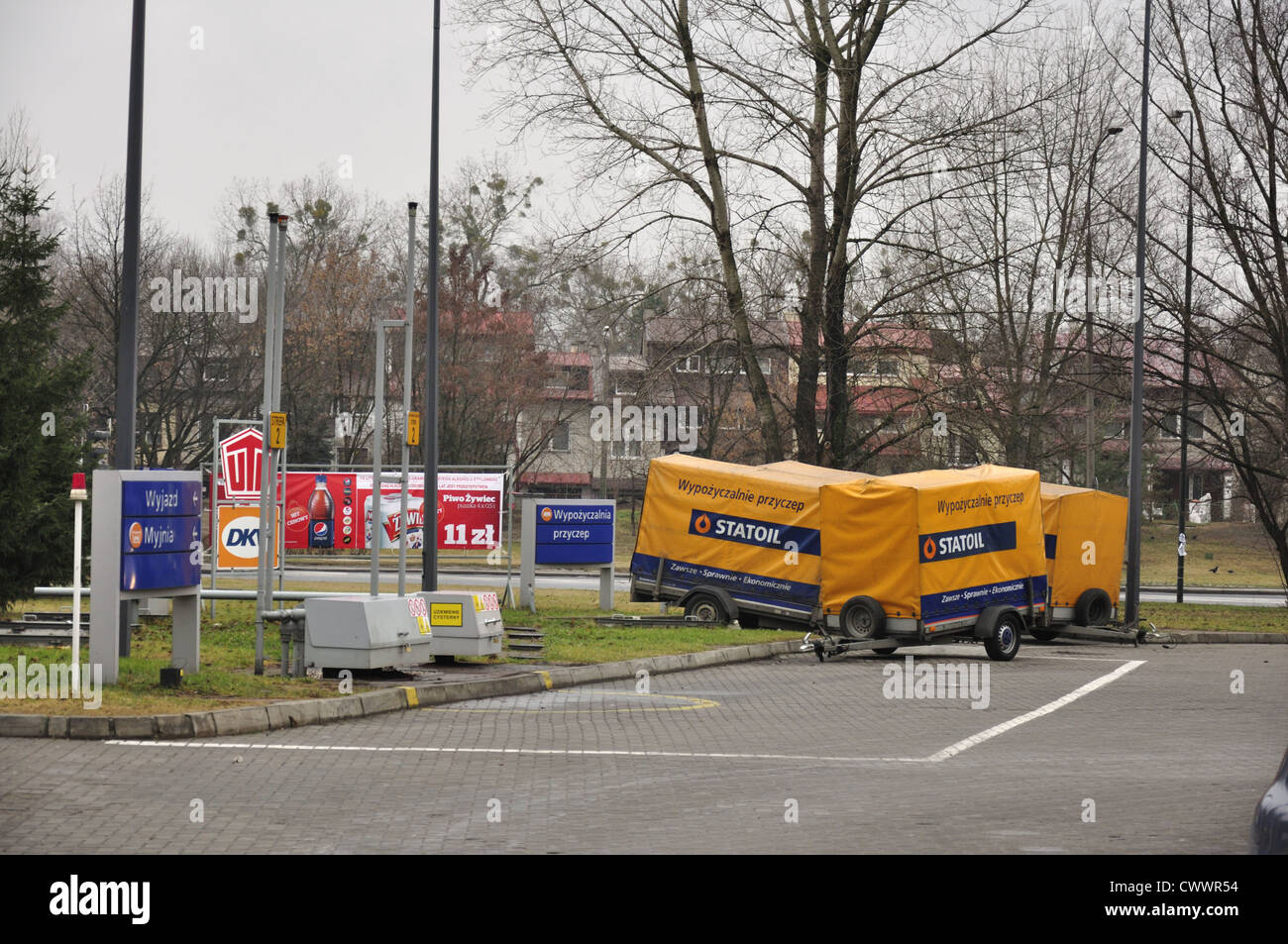 Trailers for rent on gas, petrol station Stock Photo Alamy