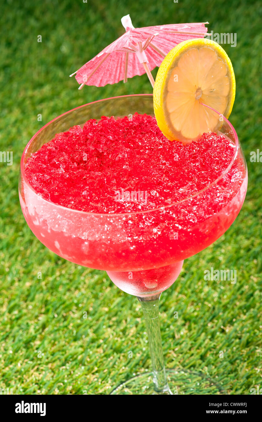 Strawberry Watermelon Daiquiri decorated with lemon and umbrella Stock