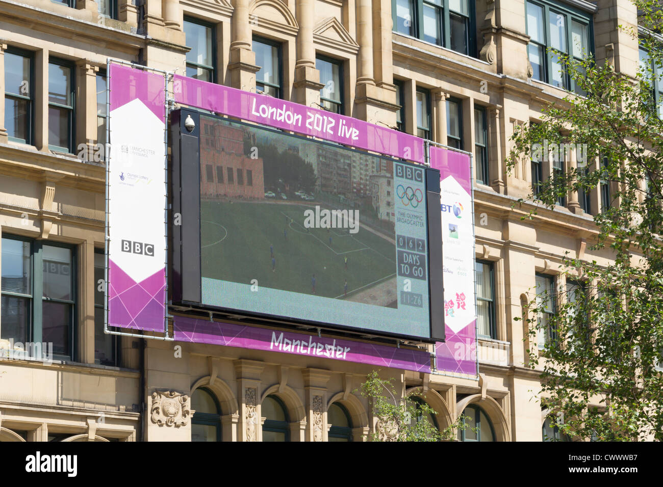 Giant TV screen mounted on Manchester's Corn Exchange building in