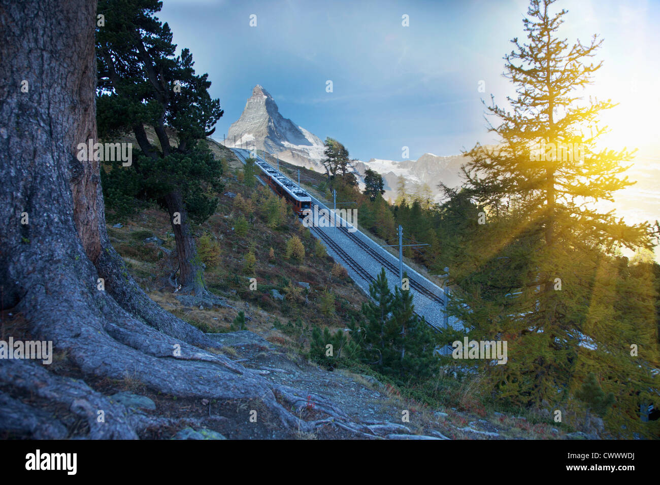 Train tracks in mountain range Stock Photo