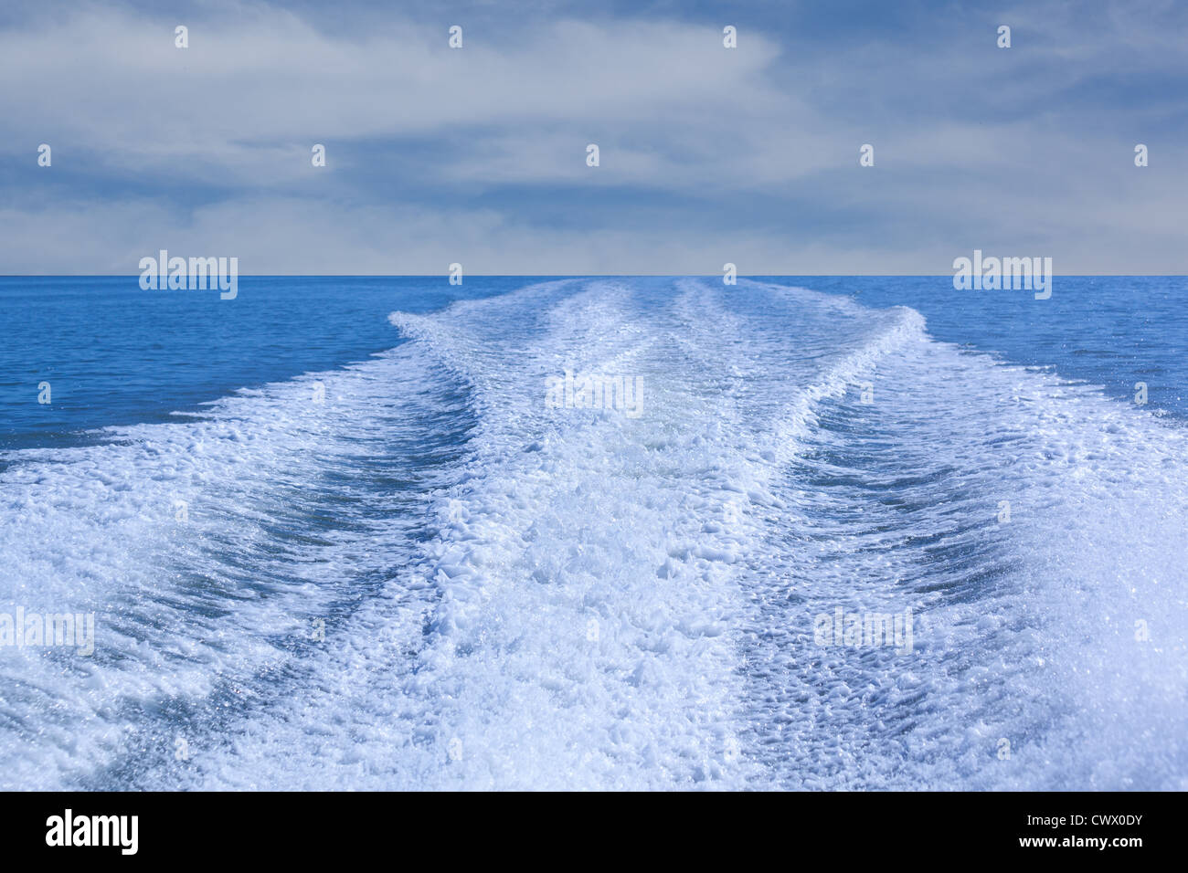 sea waves on a boat showing the horizon Stock Photo