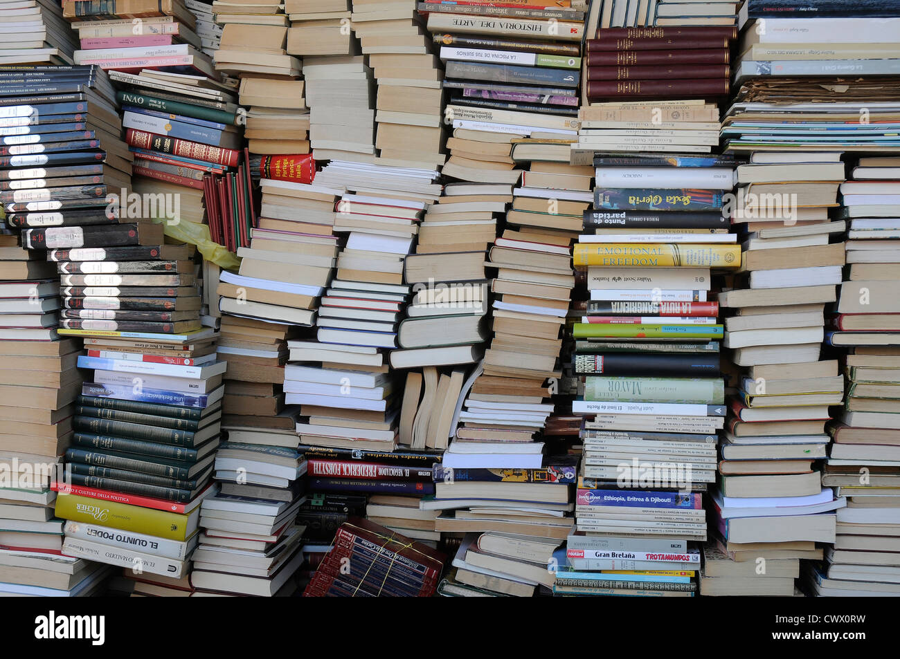 second hand piles of books stacked books second hand books stacked up stack of books Stock Photo