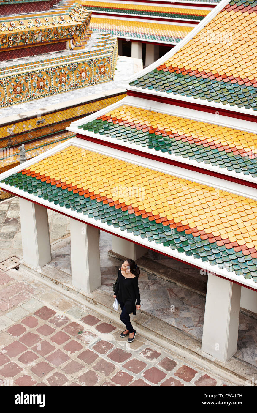 Woman exploring ornate temple Stock Photo