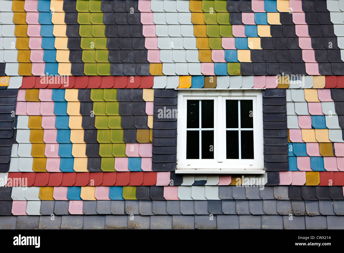 Cladding with coloured fibre cement boards like slate on an old house, Siegerland region, Germany, Europe Stock Photo
