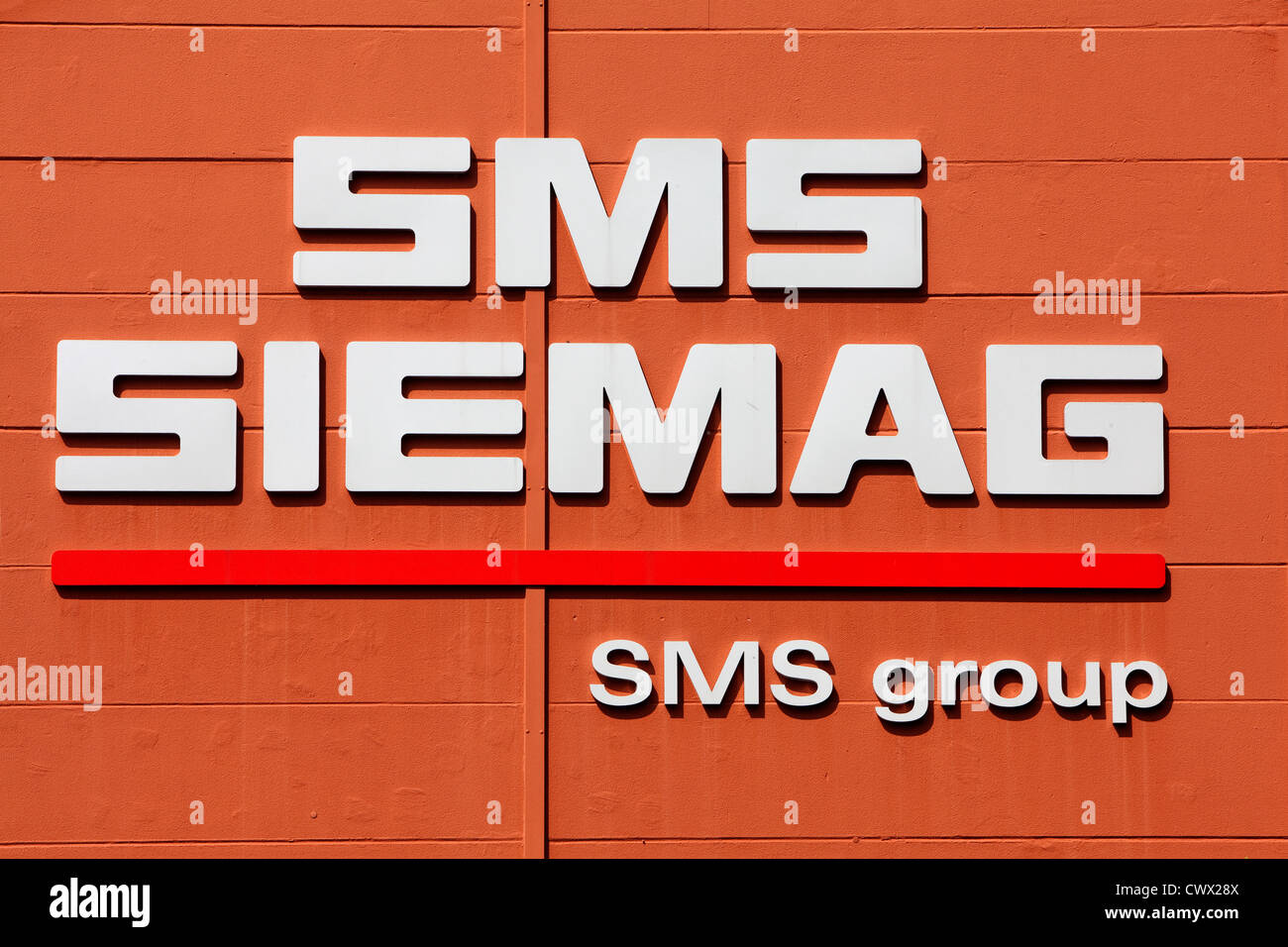 Corporate logo of the SMS Siemag AG on the factory building in Hilchenbach, North Rhine-Westphalia, Germany, Europe Stock Photo
