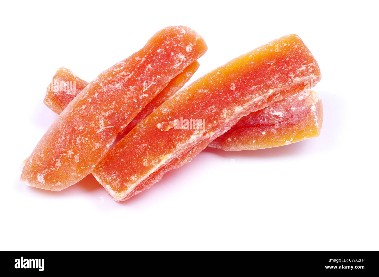 orange dried papaya slices over white background Stock Photo Alamy
