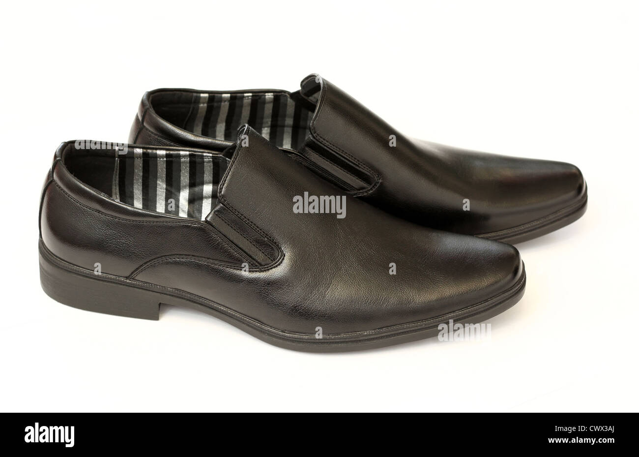 man's black shoes isolated on white background Stock Photo - Alamy