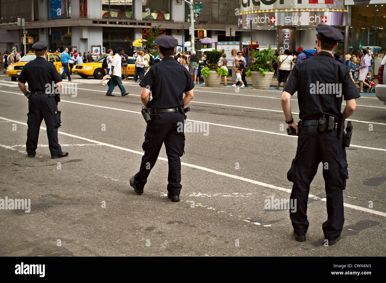Three New York City Police officers on duty near Times Square, New York ...