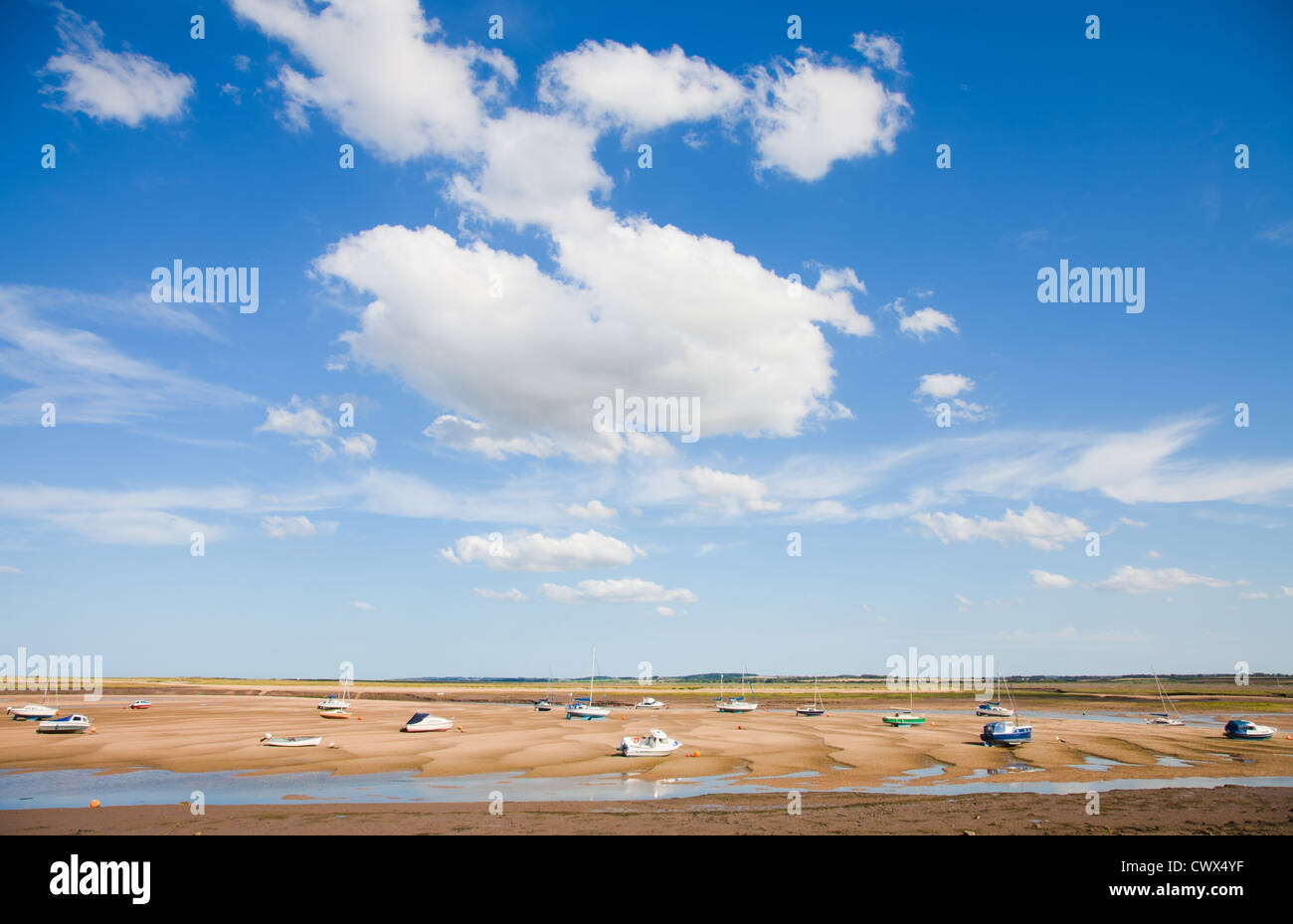 Wells-next-the-Sea, low tide, silted-up approaches to the harbor devoid of water Stock Photo
