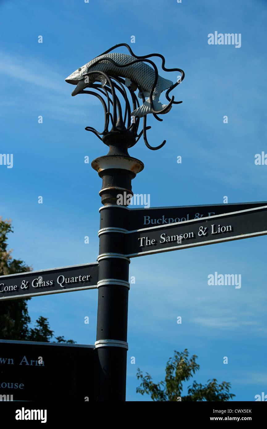 Stourbridge canal side sign post with fish sculpture in Wordsley, West Midlands Stock Photo