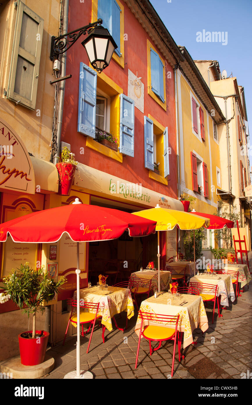 Colorful cafe and street scene in Greoux-les-Bains, Provence France Stock Photo