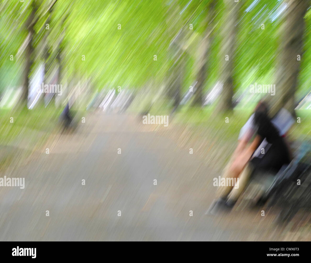 Unidentifiable young lovers on a park bench in Spring - IMAGE MANIPULATED TO REMOVE IDENTITY AND CREATE ILLUSTRATION Stock Photo