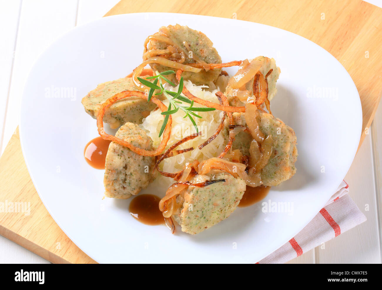 German bread dumplings with sauerkraut and fried onion Stock Photo Alamy