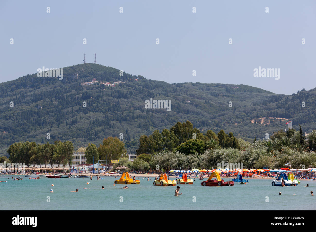 Colorful plastic paddle boats rental in Moraitika, Corfu, Ionian Islands, Greece. Stock Photo