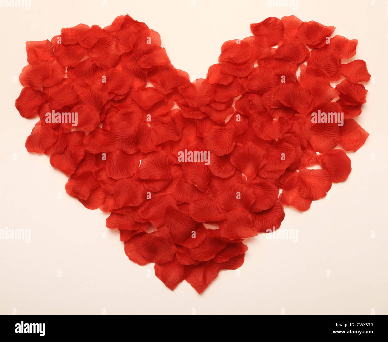 Red rose petals heart hi-res stock photography and images - Alamy