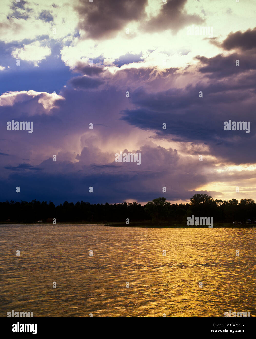 A stunning sunset over Rainbow Lake near Show Low, Arizona. Fourth of