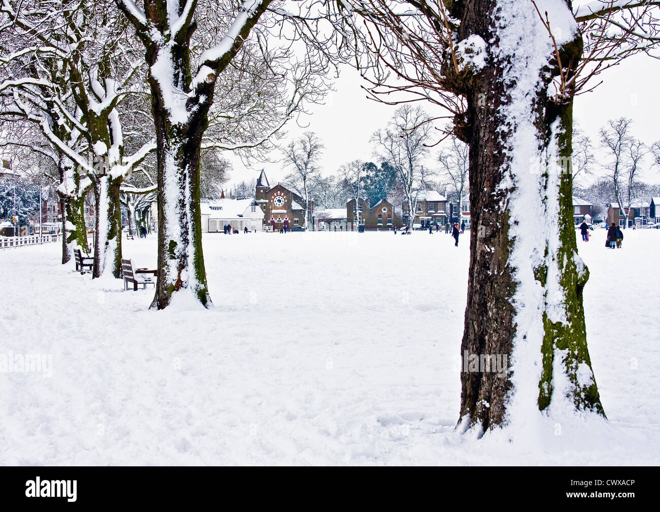 People walking on snow-covered Twickenham GreenLondon Borough of Richmond ,Greater London,UK Stock Photo