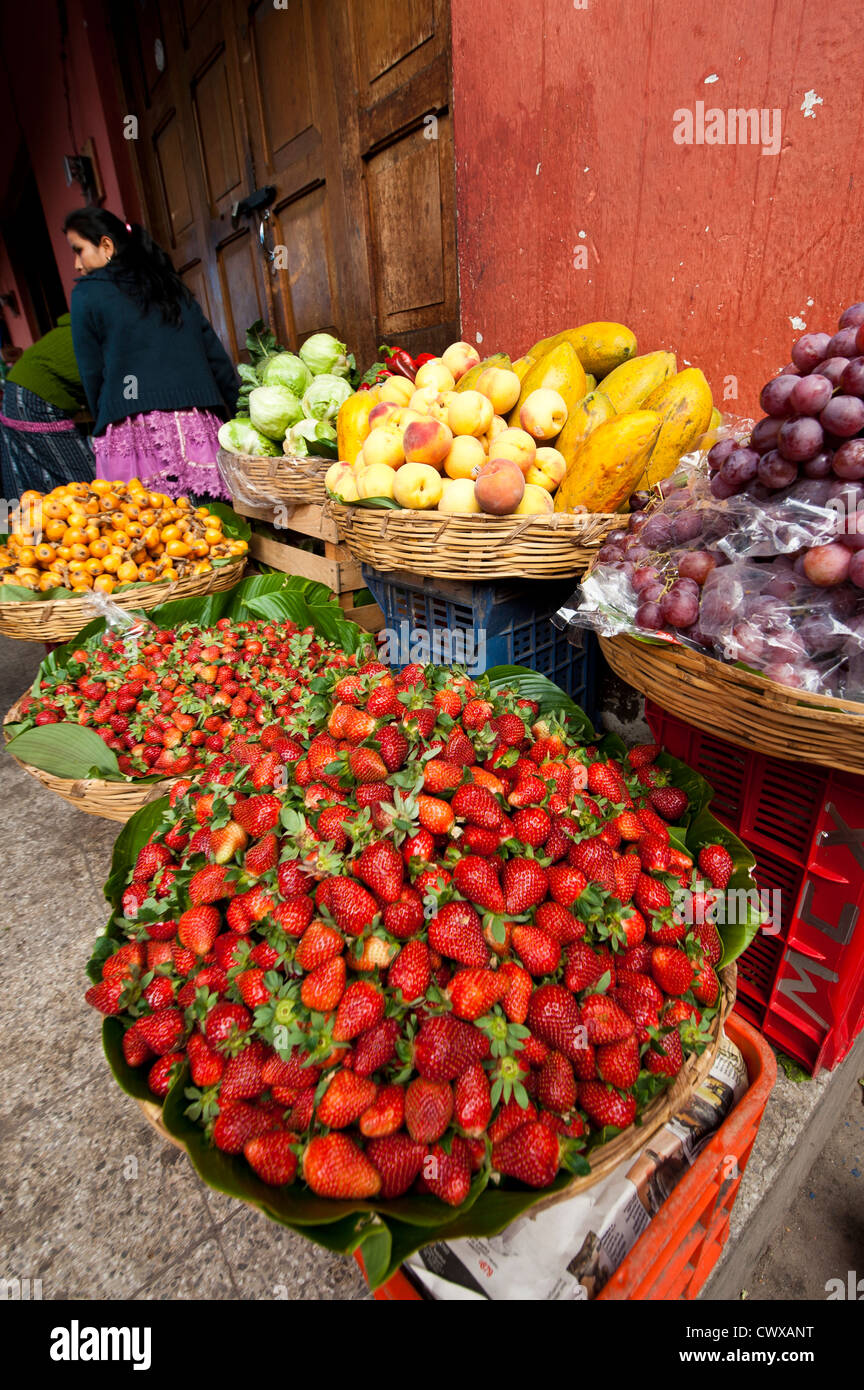 Fruit vendor in local market, Chichicastenango, Guatemala. Stock Photo