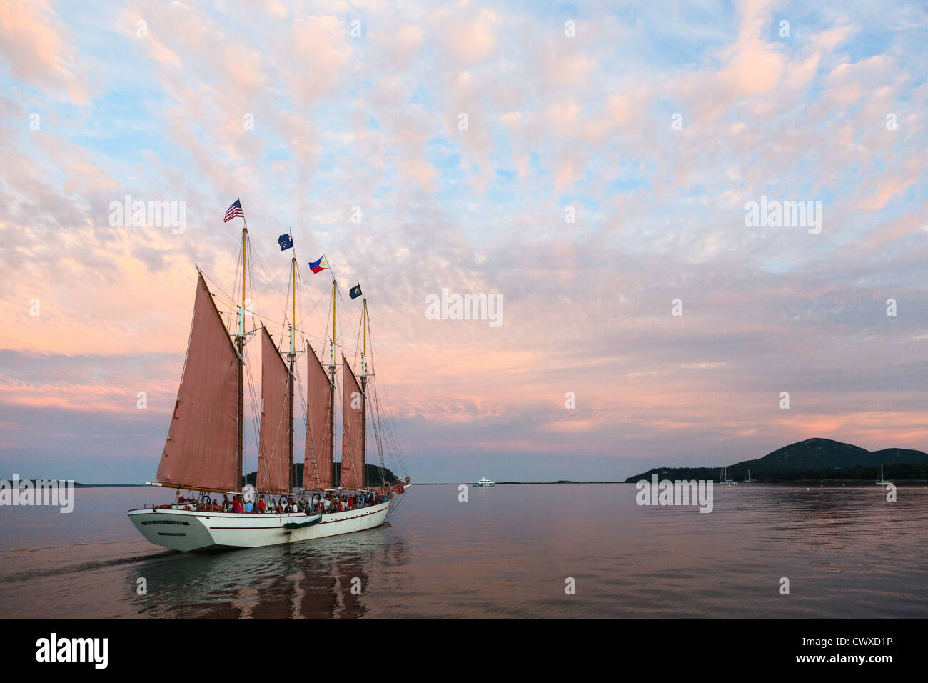 The Margaret Todd ship sailing into the sunset in Bar Harbor Maine Stock Photo