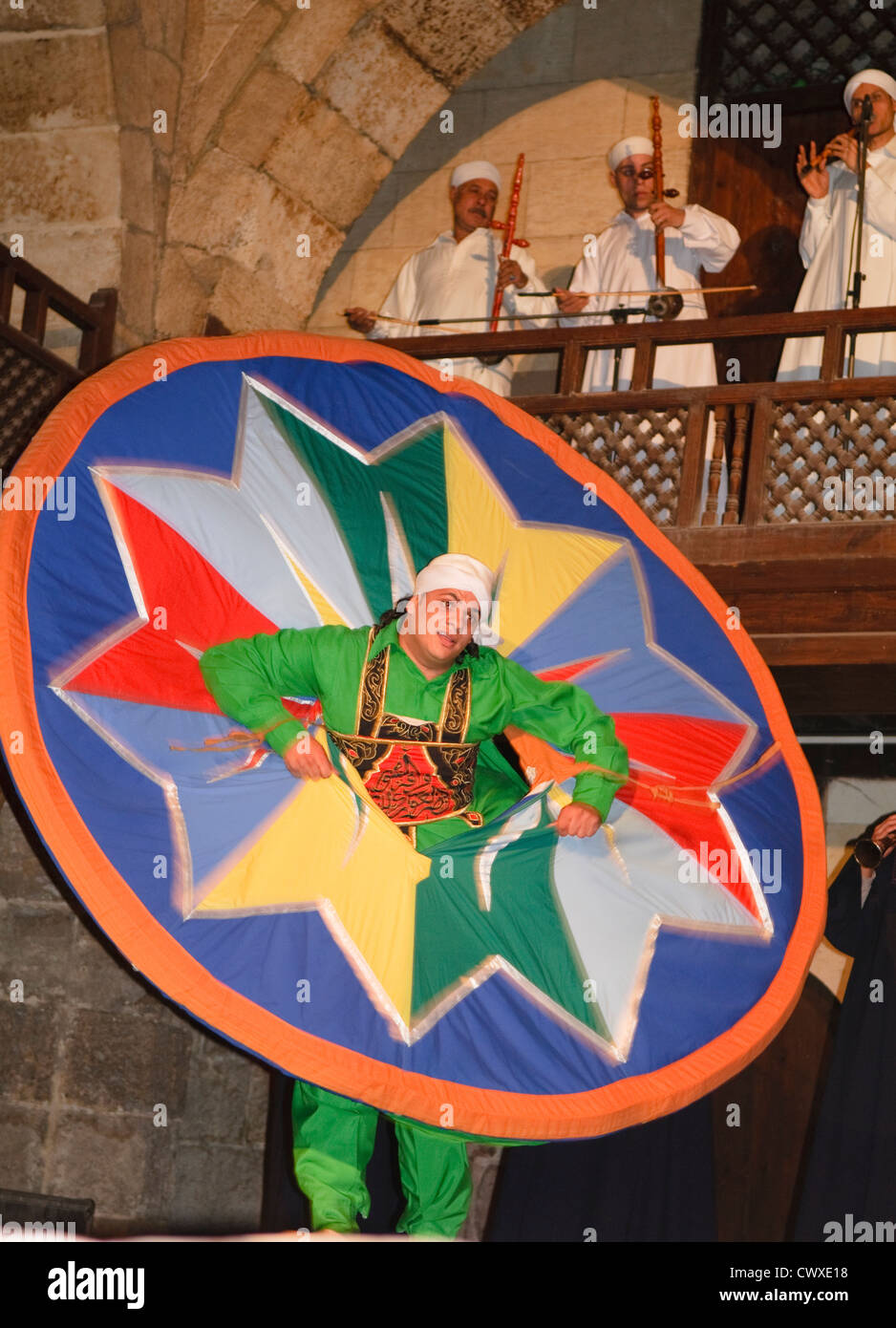 whirling dervish Sufi dancer in motion at performace in Cairo Egypt Stock Photo