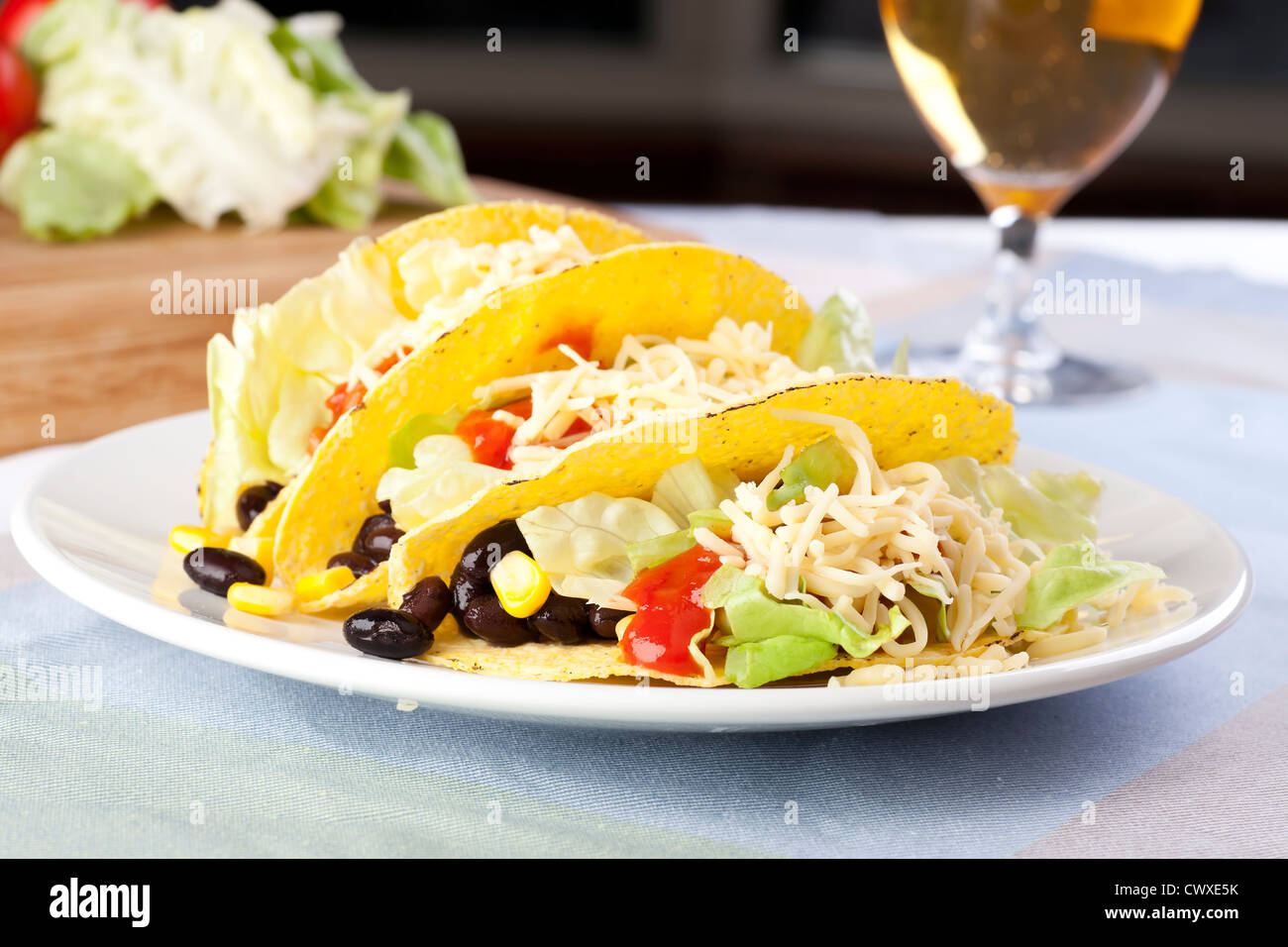 Homemade vegetarian tacos with black beans and sweet corn. Stock Photo