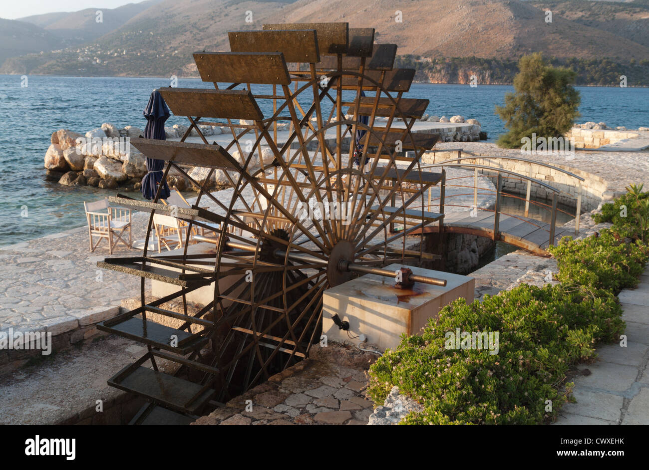 Traditional water mill at the sinkholes on Lassi area of Kefalonia island in Greece Stock Photo