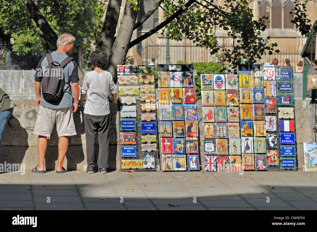 Paris, France. Stall by the river Seine selling enameled metal souvenir plaques Stock Photo