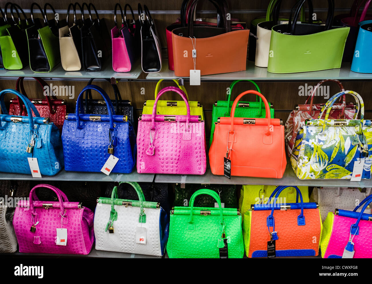 Colorful Leather Handbags in a shop in Tuscany, Italy. Stock Photo