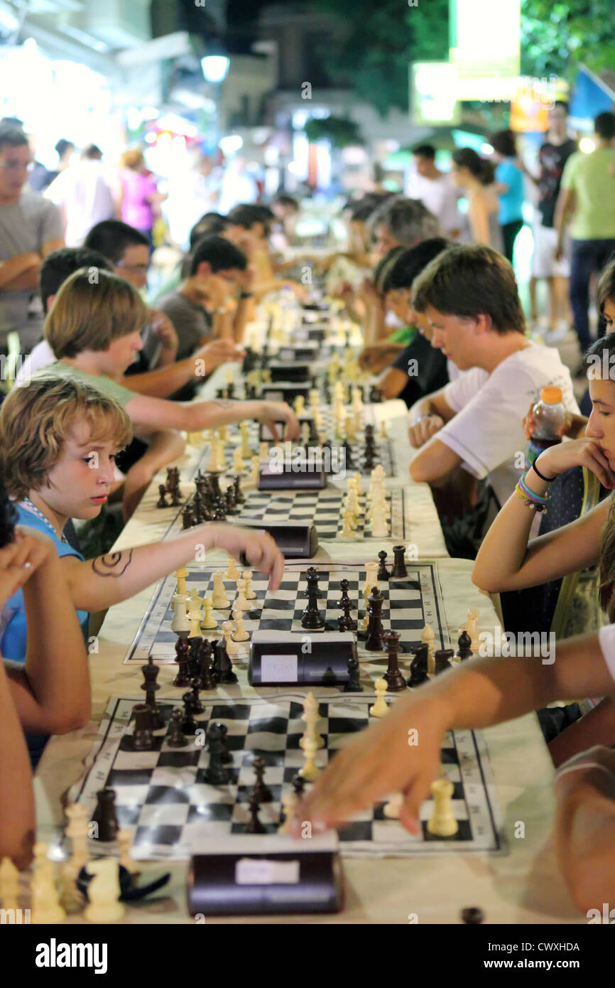 Judit Polgar and Evgeny Bareev holding the Golombek Trophy at the