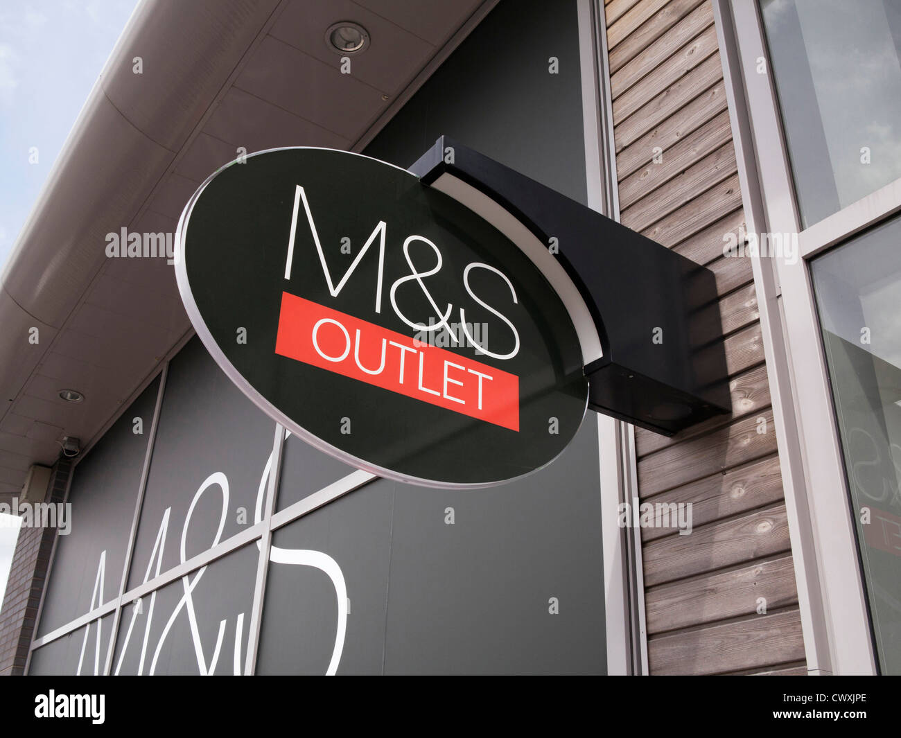 M&S sign at an retail outlet centre Stock Photo