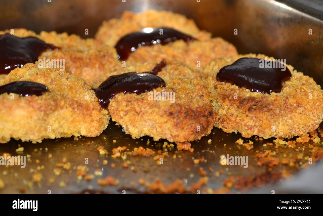 Crispy chicken nuggets with bbq sauce Stock Photo Alamy
