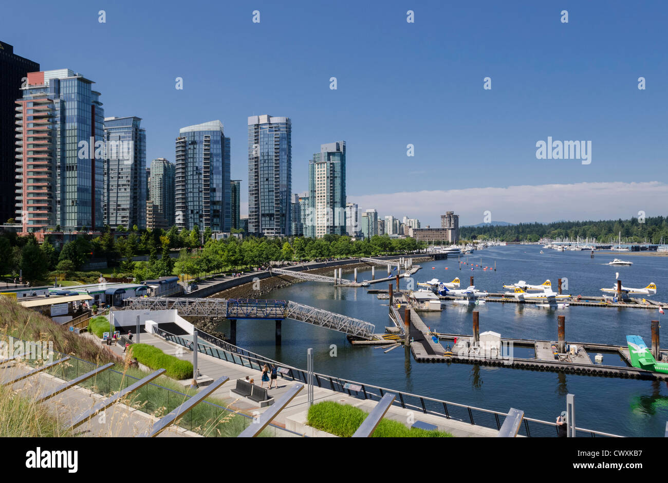 Vancouver Harbour Water Airport and apartments, West Cordova Street and Harbour Green Park, Vancouver, Canada. Stock Photo